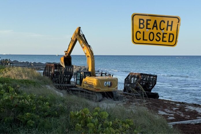 Heavy equipment and sand pipelines operate along Palm Beach’s Mid-Town shoreline during a major beach renourishment project.