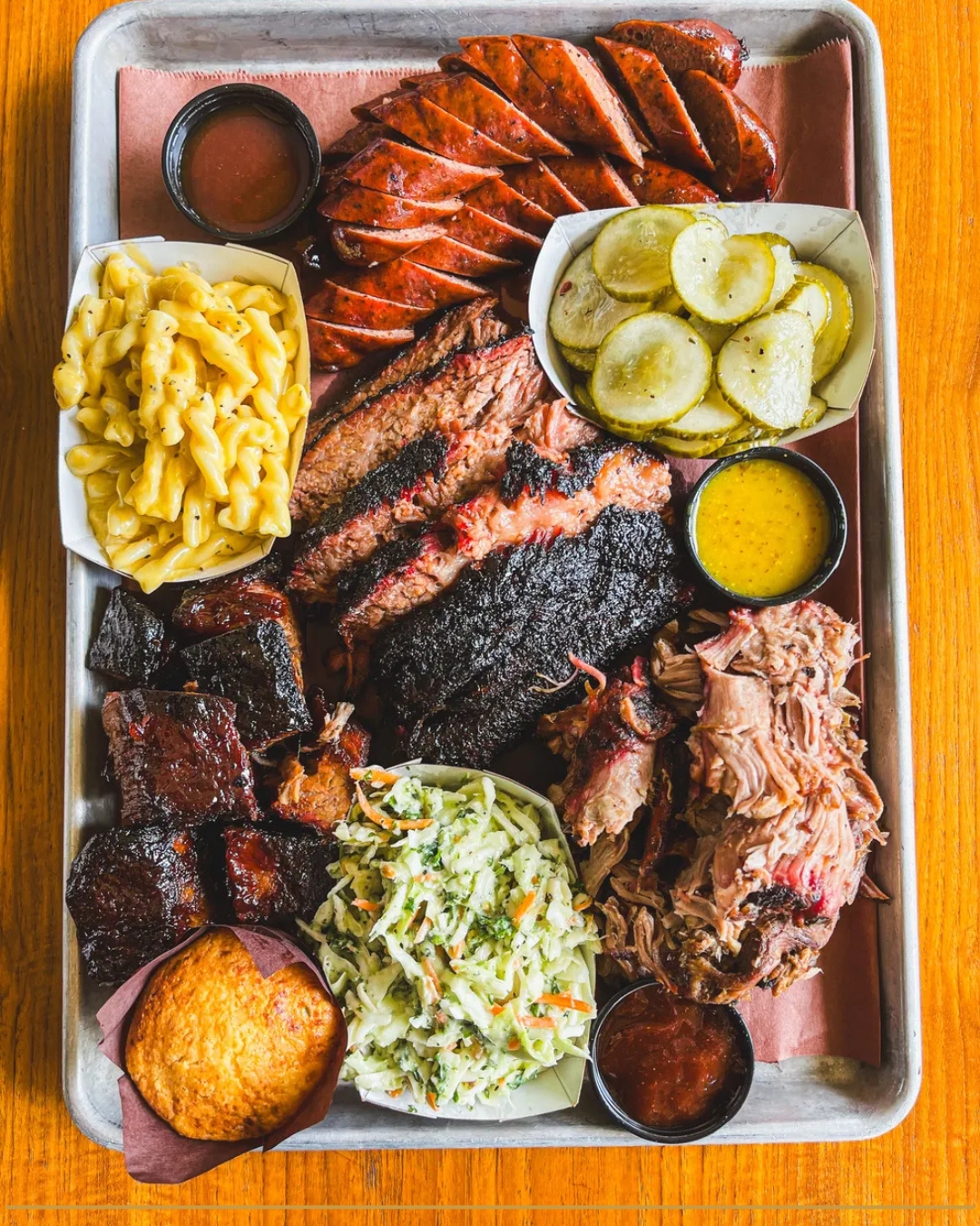 Texas-style barbecue platter from Nevs BBQ in Palm Beach Gardens with brisket and sides.