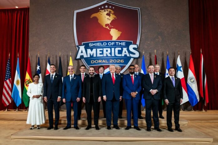 President Donald Trump attends the Shield of the Americas summit at Trump National Doral near Miami alongside leaders from across Latin America and the Caribbean.