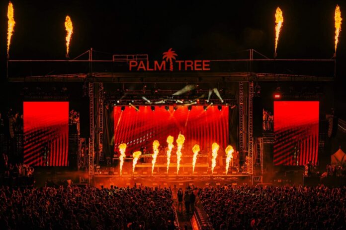Crowds gather along the West Palm Beach waterfront during the sold-out Palm Tree Music Festival featuring Kygo and Calvin Harris.