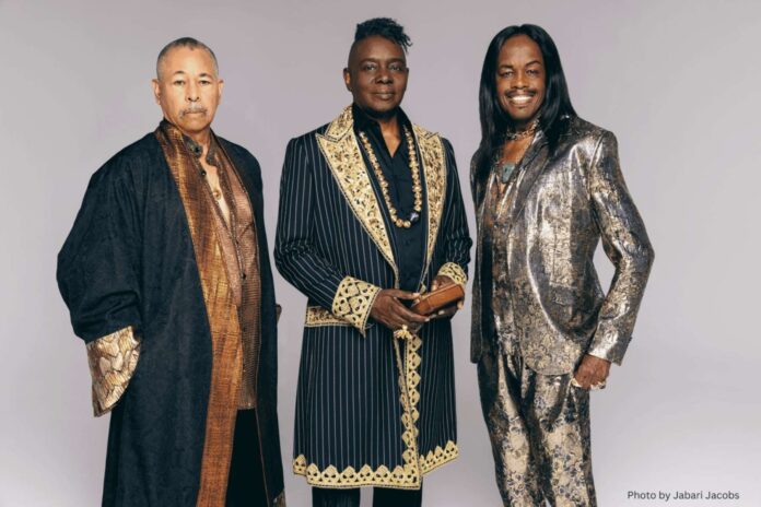 Philip Bailey, Verdine White and Ralph Johnson performing together as Earth, Wind & Fire