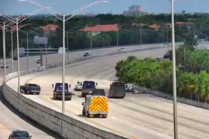 Emergency vehicles at the scene of a fatal wrong-way crash on I-95 near West Palm Beach that led to DUI manslaughter charges against Edwin Castro.