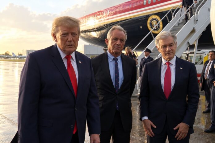 President Donald Trump with Robert F. Kennedy Jr. and Dr. Mehmet Oz beside Air Force One at Palm Beach's President Donald J. Trump International Airport.